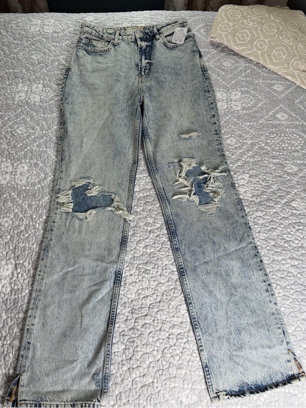 We The Free Light Blue Distressed Jeans. Size 29, new with tags.
